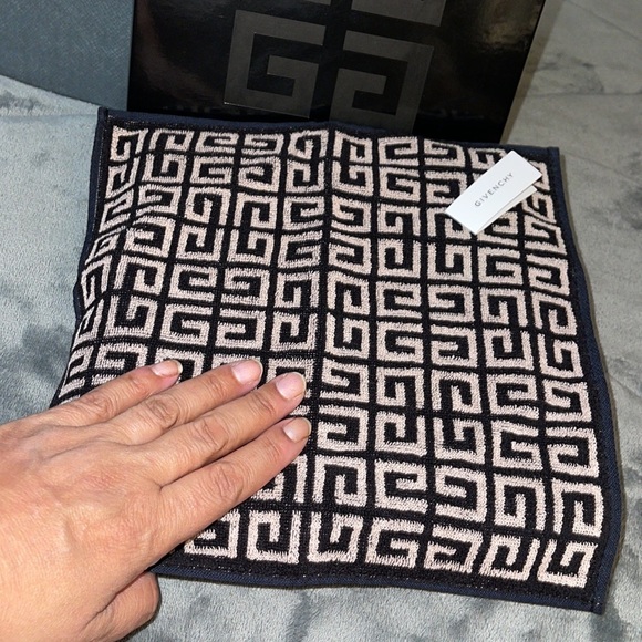 Givenchy cosmetics pouche and a wash towels comes in a set as a gift. Preloved - Picture 9 of 10